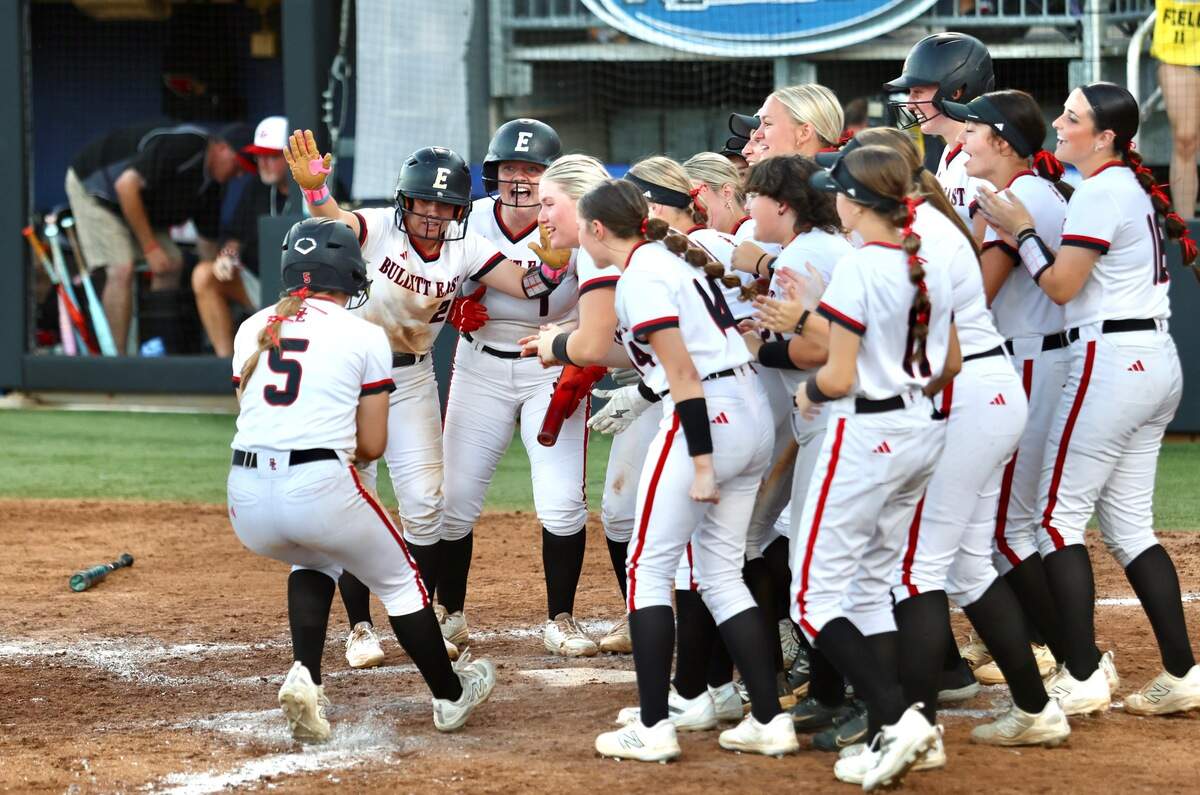The Bullitt East Chargers greeted walk-off home run hitter Allie Carter (5) at the plate after her two-run blast capped a 13-3 win over George Rogers Clark in five innings of the Softball State Tournament semifinals at the University of Kentucky’s John Cropp Stadium on Friday. Photos available for purchase at KHSAA.zenfolio.com.