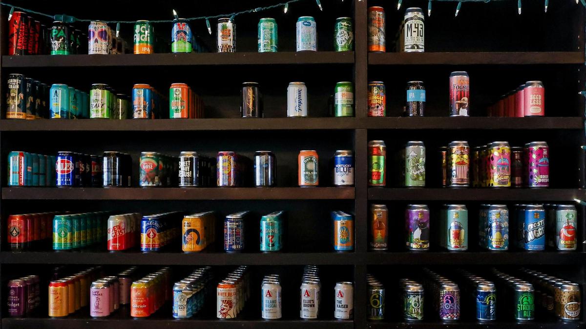 A variety of canned beer for sale at The Beer Trappe, which mainly sells beer but also has a few ciders, non-alholic options and some craft sodas from Italy.