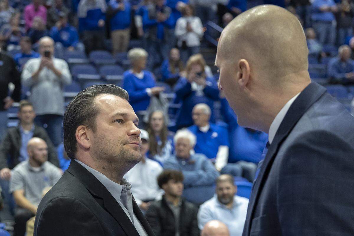 Kentucky head coach Mark Pope, right, connects with Western Kentucky head coach Hank Plona before Tuesday night’s tipoff in Rupp Arena.