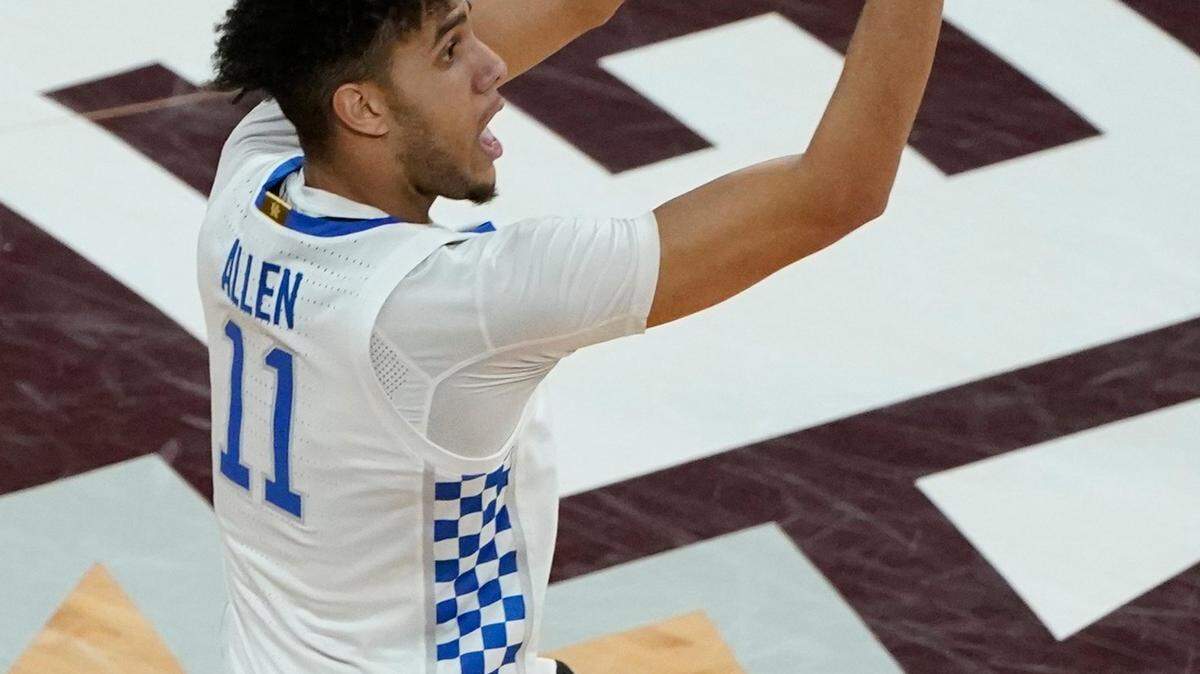 Kentucky guard Dontaie Allen (11) attempts a shot during the second half of an NCAA college basketball game against Mississippi State in Starkville, Miss., Saturday, Jan. 2, 2021. Kentucky won 78-73. (AP Photo/Rogelio V. Solis)