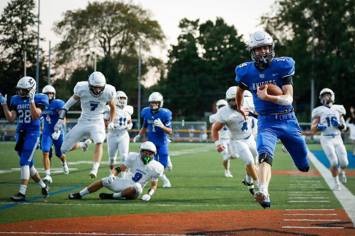 Lexington Catholic’s Jack Gohmann (14) passed for 17 touchdowns and ran for five last season.