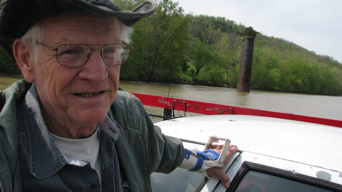 David Odor of Richmond rode the Valley View Ferry on Thursday, April 21, 2011. The bridge pier in the background is a remnant of the "Riney B" Railroad that once chugged across the Kentucky River and through Richmond, Irvine, Nicholasville and Beattyville. Photo by Greg Kocher | Staff
gkocher1@herald-leader.com