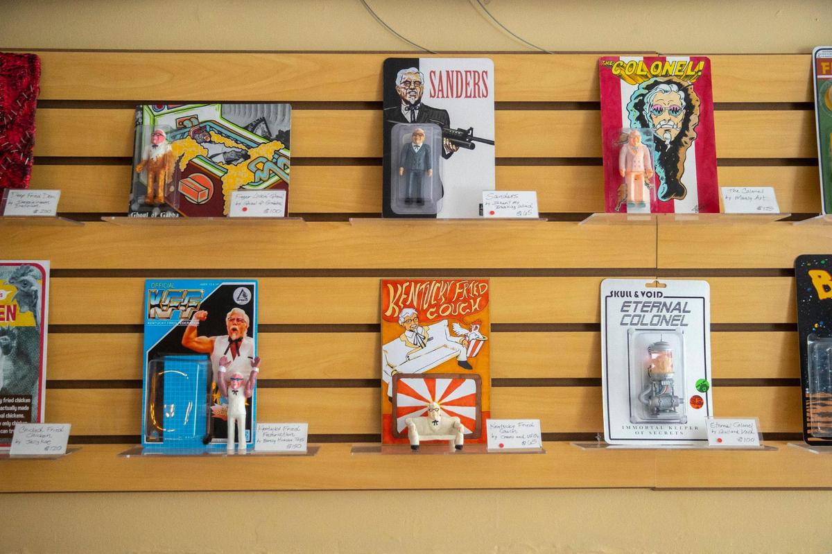 “The Colonel”, a group art toy show featuring interpretations of Colonel Sanders-style resin figures sculpted by Scott Cherry, is on display at Earth to Kentucky in Covington, Ky., through May 8.