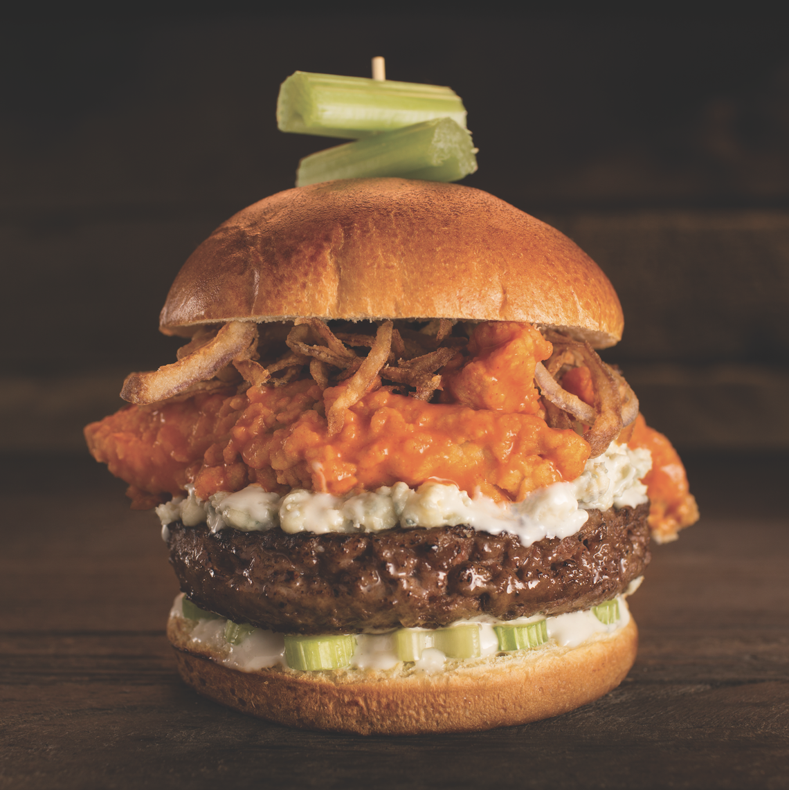 Dave & Buster’s menu features lots of over-the-top items, including the Buffalo Wing Burger, which is a burger topped with hand-breaded Buffalo chicken tenders, bleu cheese and served with seasoned tots.