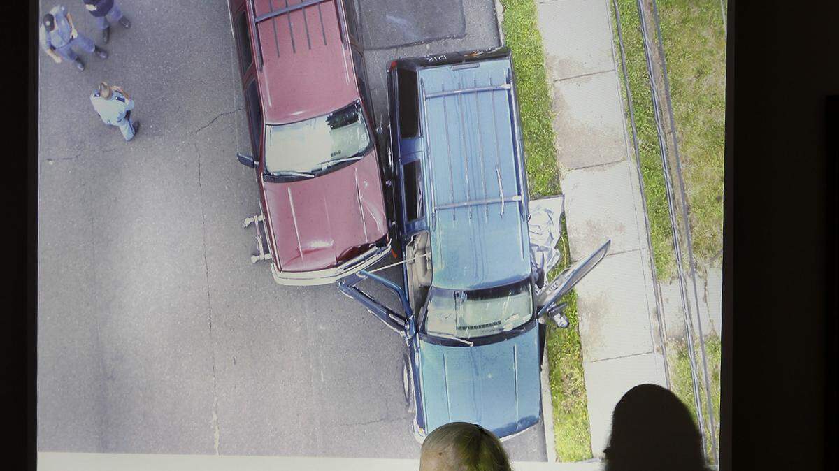 During her cross-examination of Kentucky State Police instructor Richard Parkos, defense attorney Kate Dunn went over  photos of a re-enactment of the crash that killed Lexington police officer Bryan  Durman on April 29, 2010. Parkos conducted the  re-enactment May 26 after reviewing two crash investigation reports — one for the prosecution and one for the defense.     