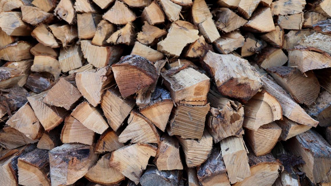 Wood sits outside, waiting to be smoked at LX BBQ, 226 Walton Ave., Monday, Feb. 3, 2025 in Lexington, Ky. The new craft barbecue restaurant uses mainly red oak to smoke its meats and white oak when available.