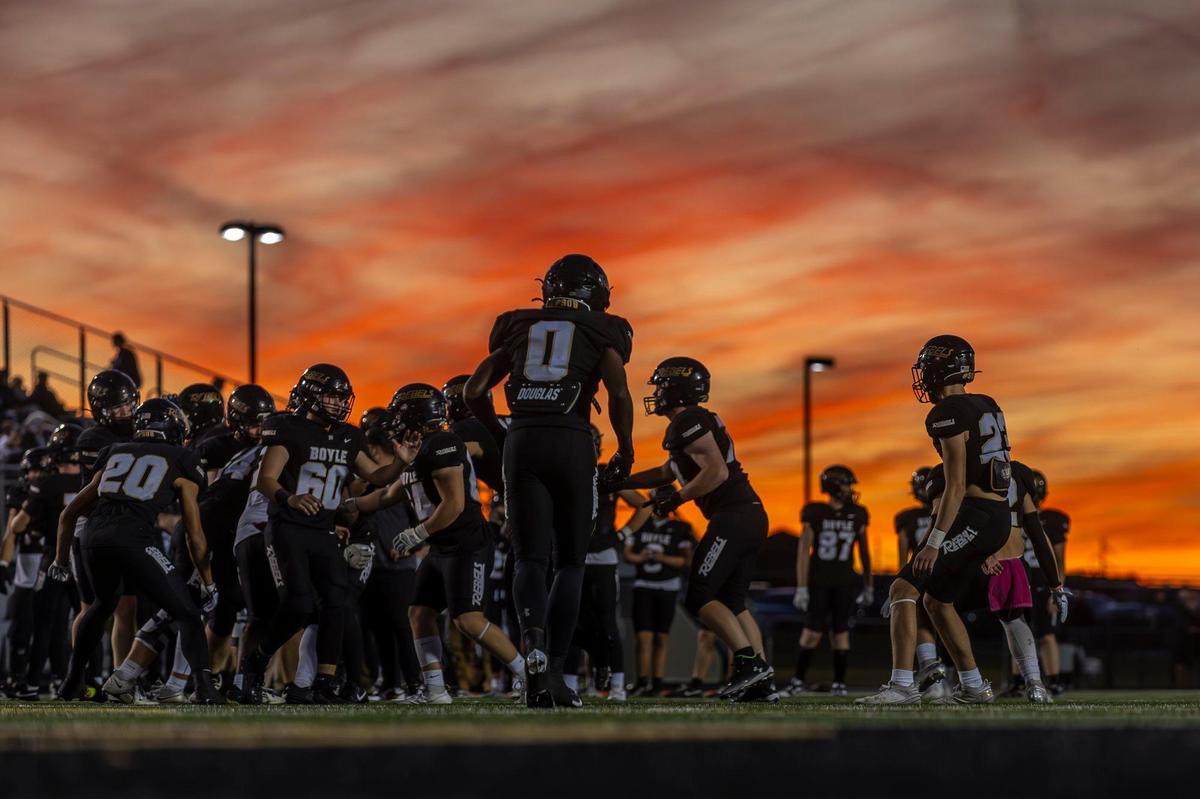 Boyle County players warm up prior to their game against Frederick Douglass on Nov. 1. The Rebels are four-time defending Class 4A state champions.