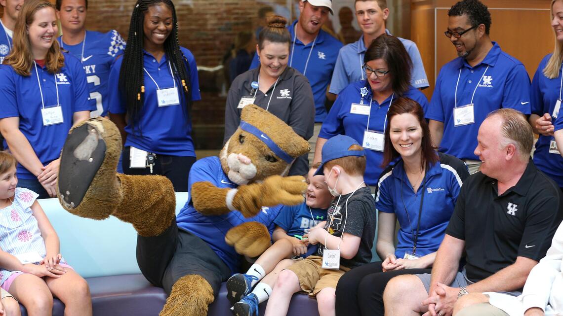 UK football team, PGA pros team up to brighten kids’ spirits