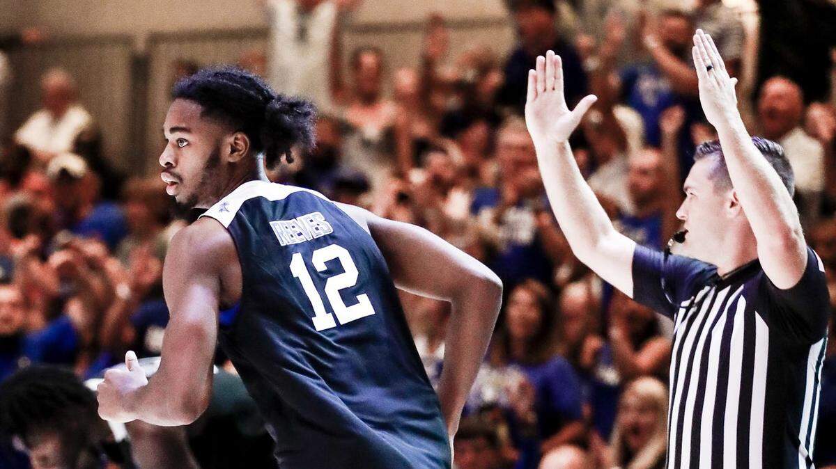 Antonio Reeves runs back down the court after hitting a three-pointer against the Bahamas National Select Team on Sunday, Aug. 14, 2022, in Nassau, Bahamas.