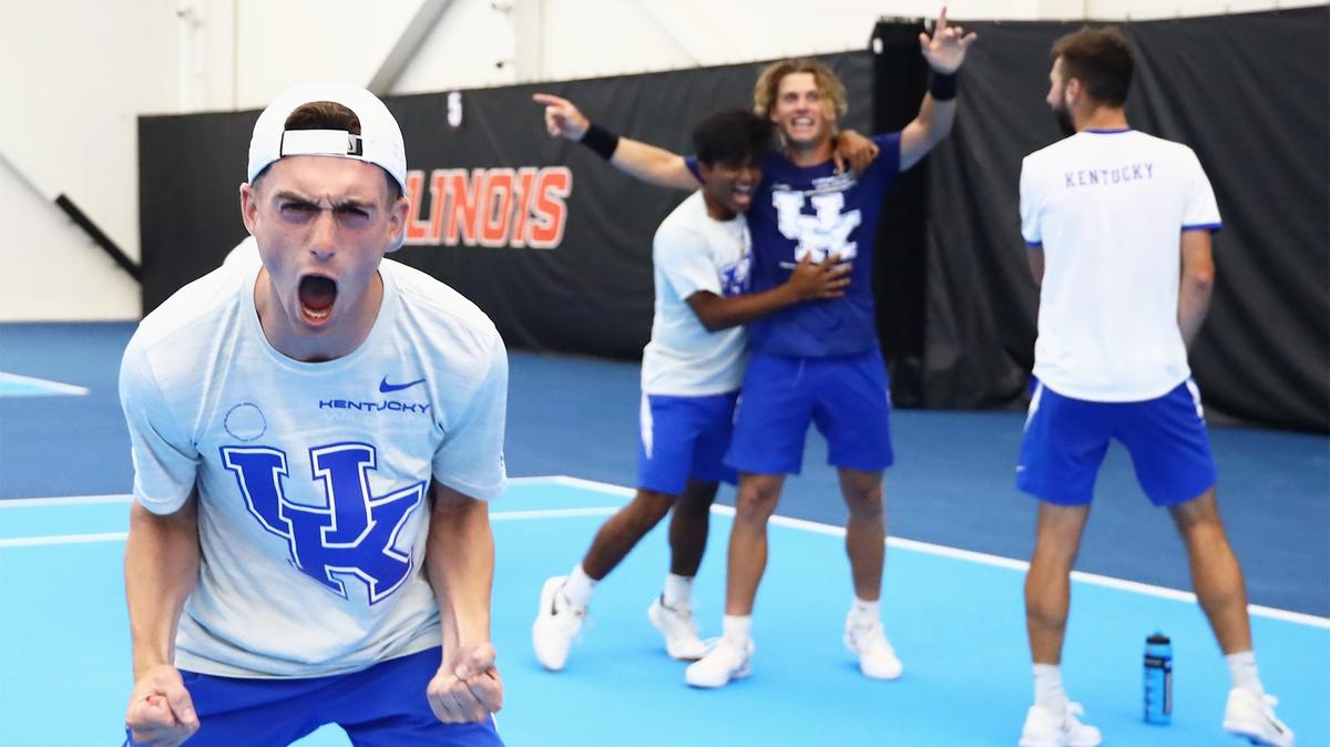 The Kentucky men’s tennis team celebrates its NCAA Men’s Tennis Tournament semifinal win over Ohio State on Saturday afternoon inside the Atkins Tennis Center in Champaign, Illinois. UK will play in Sunday’s championship match, marking the first time that Kentucky will play for the NCAA title.