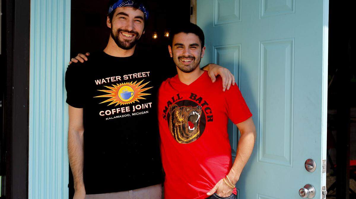 Chris Ortiz, left,  and Salvador Sanchez opened A Cup of Common Wealth on July 1, 2013.