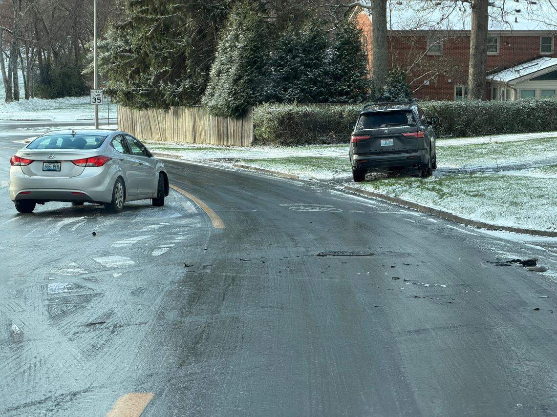 Cars slide off the road on Chinoe Road in Lexington, Ky. on March 17, 2026.