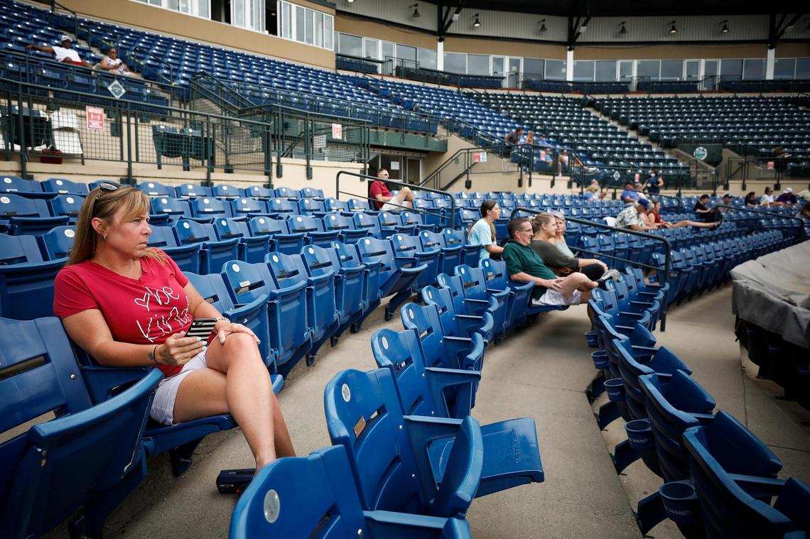 Marci Epperson of Louisville watched her son Myles Epperson play on the Xpress Green team during a Commonwealth Collegiate Baseball League game at Whitaker Bank Ballpark in Lexington on Tuesday.