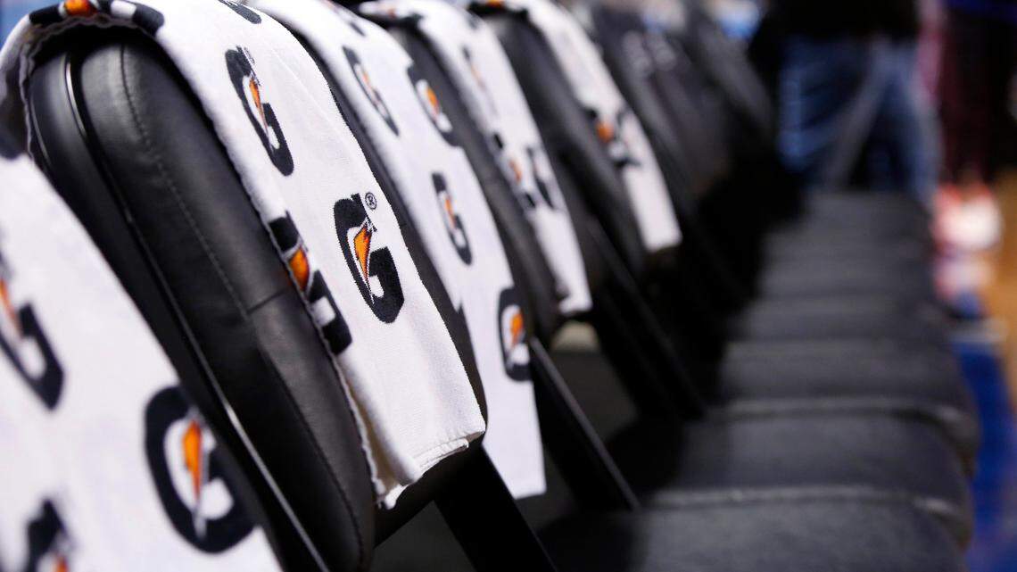 Empty chairs for athletes are seen after the NCAA college basketball games at the Atlantic Coast Conference tournament were canceled due to the coronavirus in Greensboro, N.C., Thursday, March 12, 2020. (AP Photo/Ben McKeown)