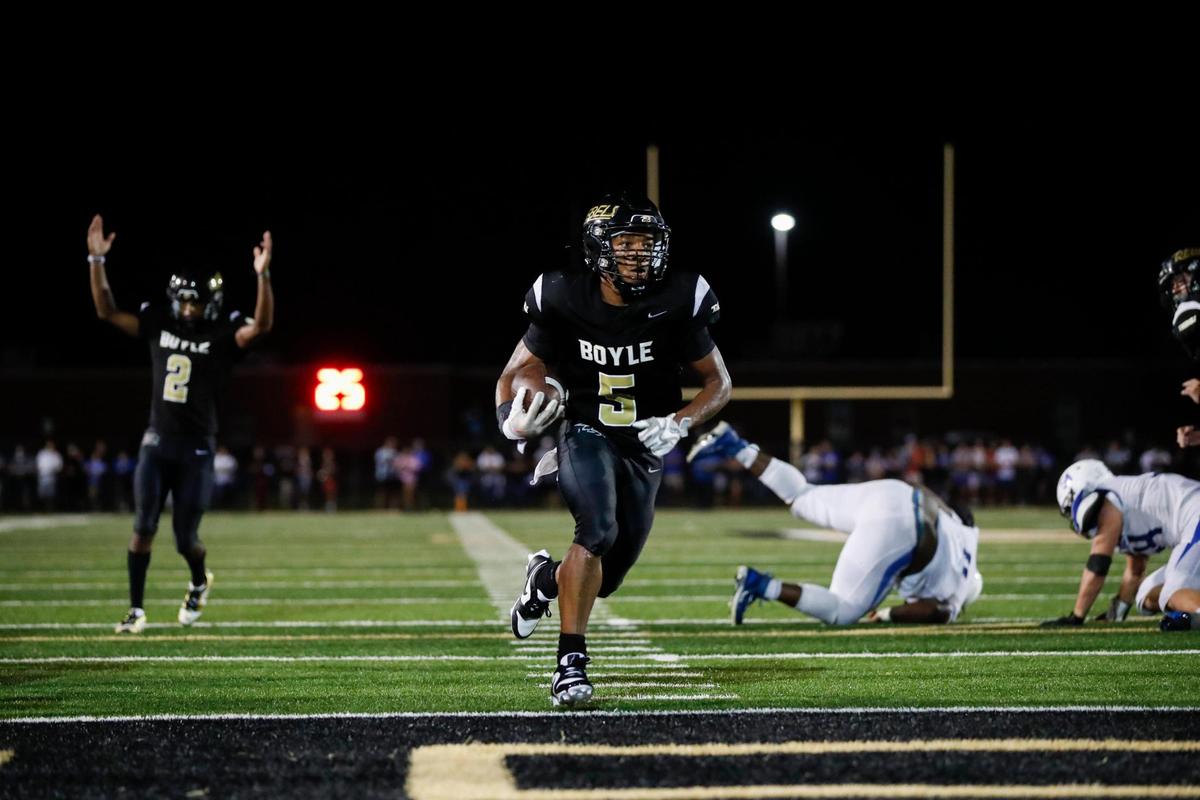 Boyle County’s Montavin Quisenberry (5) rushes for a touchdown against Lexington Christian during the Rebels’ 47-38 win over the Eagles in the Rebel Bowl in Danville on Saturday.
