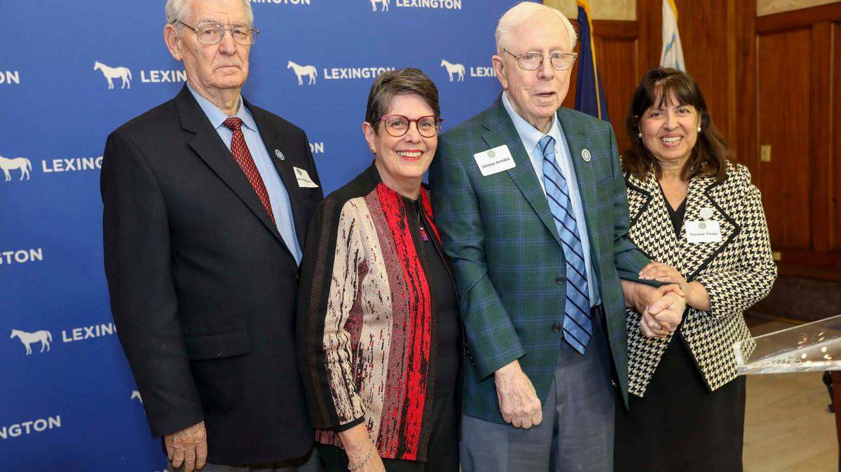 Former Mayor Scotty Baesler, Mayor Linda Gorton, former Mayor James Amato and former Mayor Teresa Isaac during a reception celebrating the 50th anniversary of the start of Lexington’s merged government at the Government Center March 21, 2024.