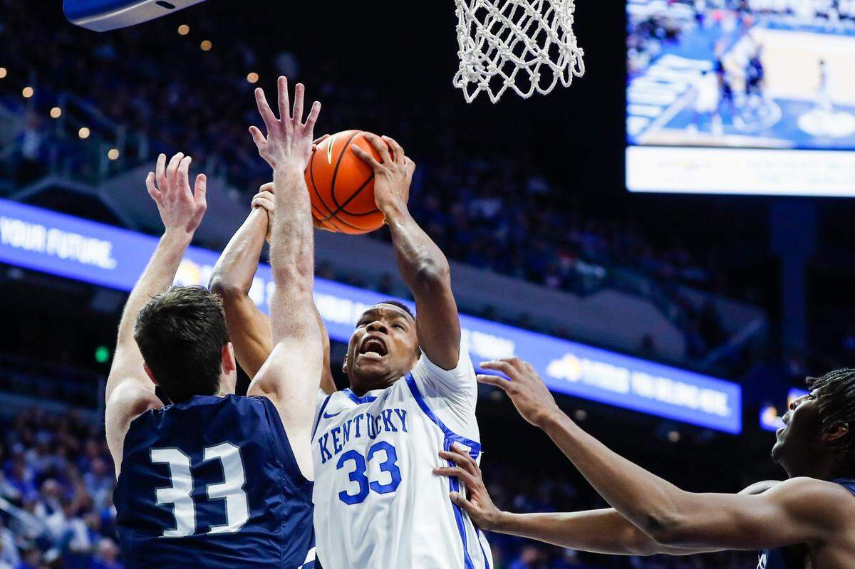 Kentucky freshman Ugonna Onyenso grabs a rebound against North Florida’s Oscar Berry during Wednesday’s game at Rupp Arena. Onyenso finished with seven points, 10 rebounds and three blocked shots.
