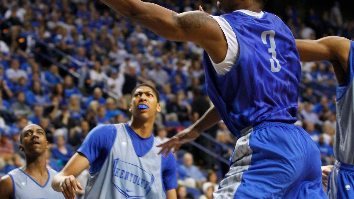 Kentucky Wildcats forward Terrence Jones (3) went in for two of his 52 points during the Blue-White game on Wednesday. Jones says a deeper Kentucky team will make a difference this season.