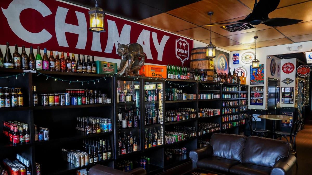 A variety of beers on the retail wall at The Beer Trappe. Owner Brett Behr said close to 70% of their sales come from the bar, not retail.