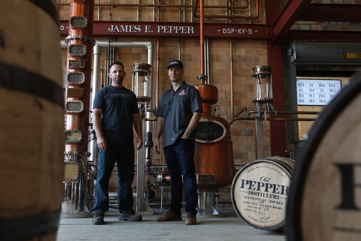 Master distiller Aaron Schorsch, left, and proprietor Amir Peay at James E. Pepper Distillery on Manchester Street. Peay petitioned and got the distillery's original DSP number from the federal government.