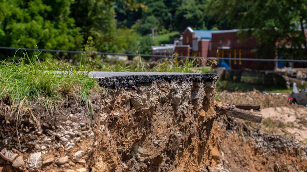 A section of road along KY-3351 by a bridge over Troublesome Creek near Ary in Perry County, Ky., remains damaged Tuesday, Aug. 2, 2022, following flooding last week that devastated many counties in Eastern Kentucky.