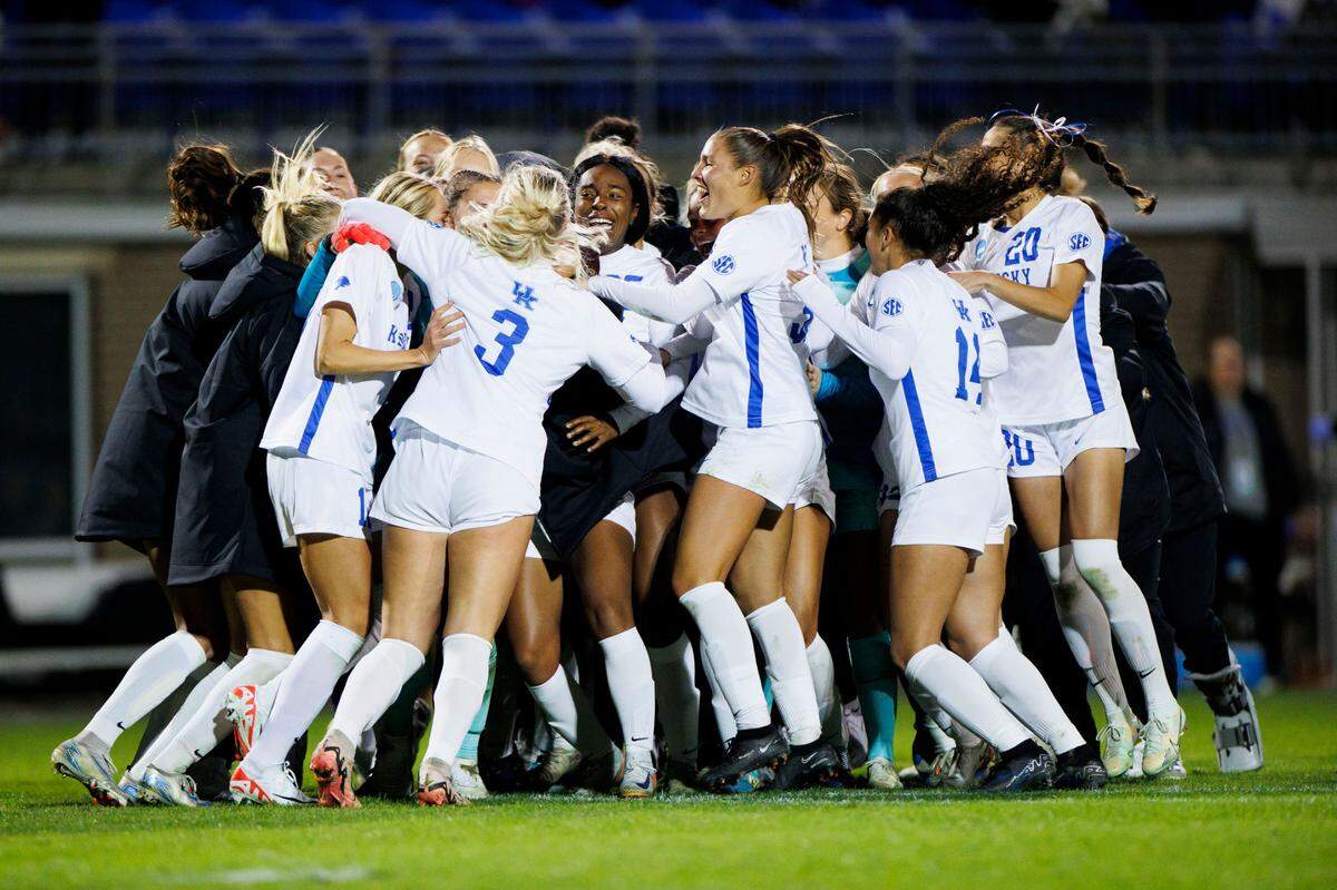 The Kentucky women’s soccer team celebrates winning a penalty kick shootout over West Virginia in the first round of the 2024 NCAA Tournament on Nov. 15, 2024, at the Wendell and Vickie Bell Soccer Complex in Lexington.