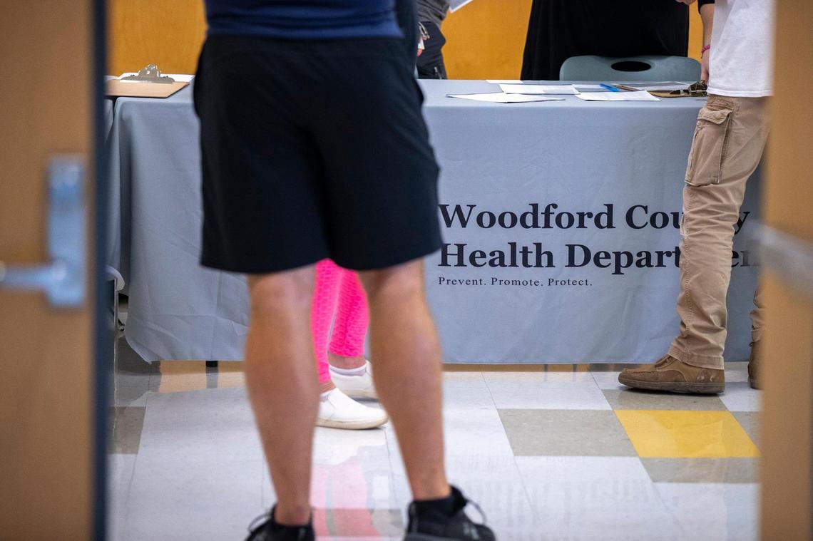 People register to get the COVID-19 vaccine at a vaccination clinic at Versailles Presbyterian Church in Woodford County on Wednesday, Sept. 1, 2021. Woodford County has the highest vaccination rate in the state.