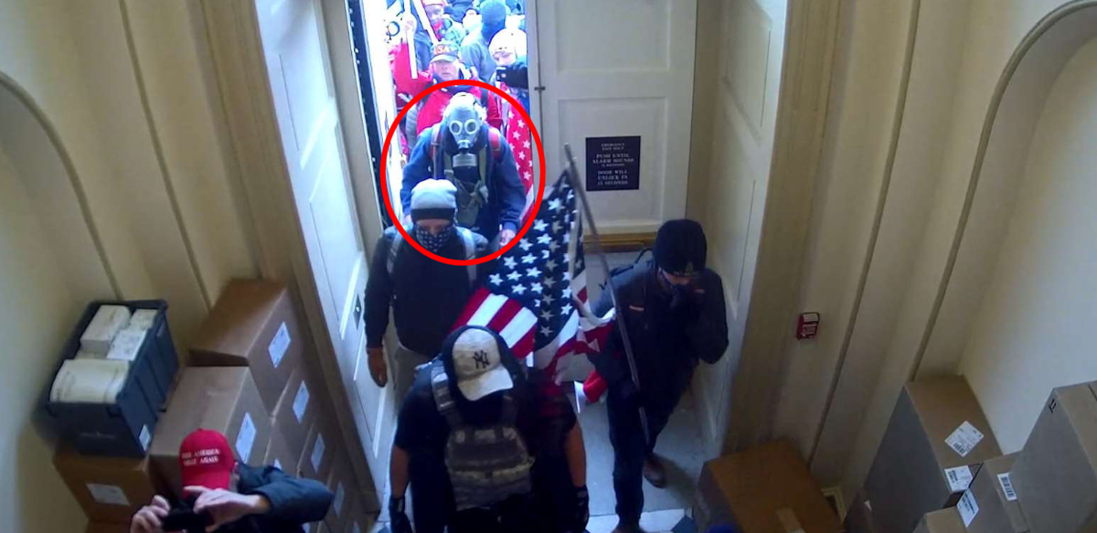 The FBI said in a court statement that this photo from a security camera shows Daniel Wilson of Kentucky, in the red circle, entering the U.S. Capitol building during the Jan. 6, 2021 insurrection.