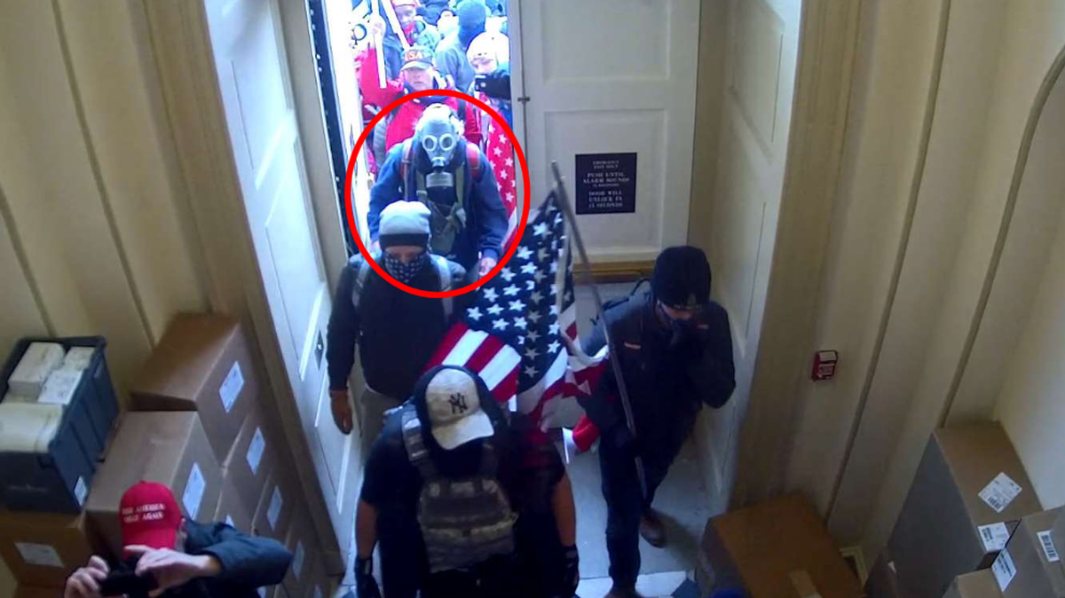 The FBI said in a court statement that this photo from a security camera shows Daniel Wilson of Kentucky, in the red circle, entering the U.S. Capitol building during the Jan. 6, 2021 insurrection.