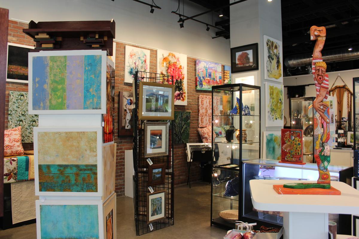 Art hangs on the walls of the ArtHouse Kentucky gallery in Lexington, Kentucky on Monday, Nov. 18, 2024