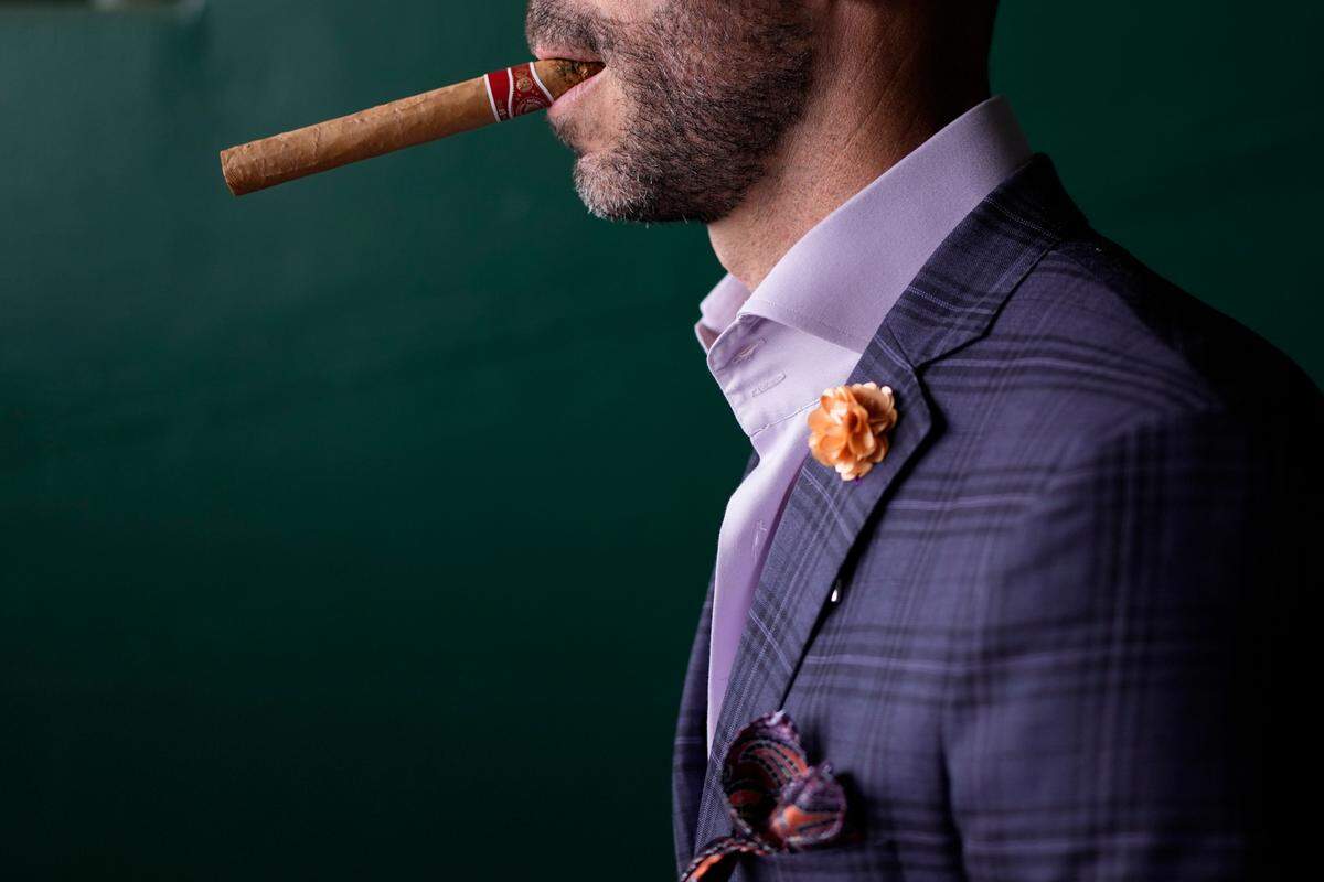 A man walks to his seat on the day of the 149th running of the Kentucky Derby at Churchill Downs Saturday, May 6, 2023, in Louisville, Ky. (For the Herald Leader/Bryan Woolston)