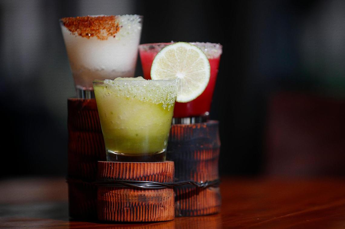 The signature margarita slush flight including the Margarita de Casa with prickly pear, the Rocoto Spiced Margarita and the Green Goddess Margarita at Corto Lima.