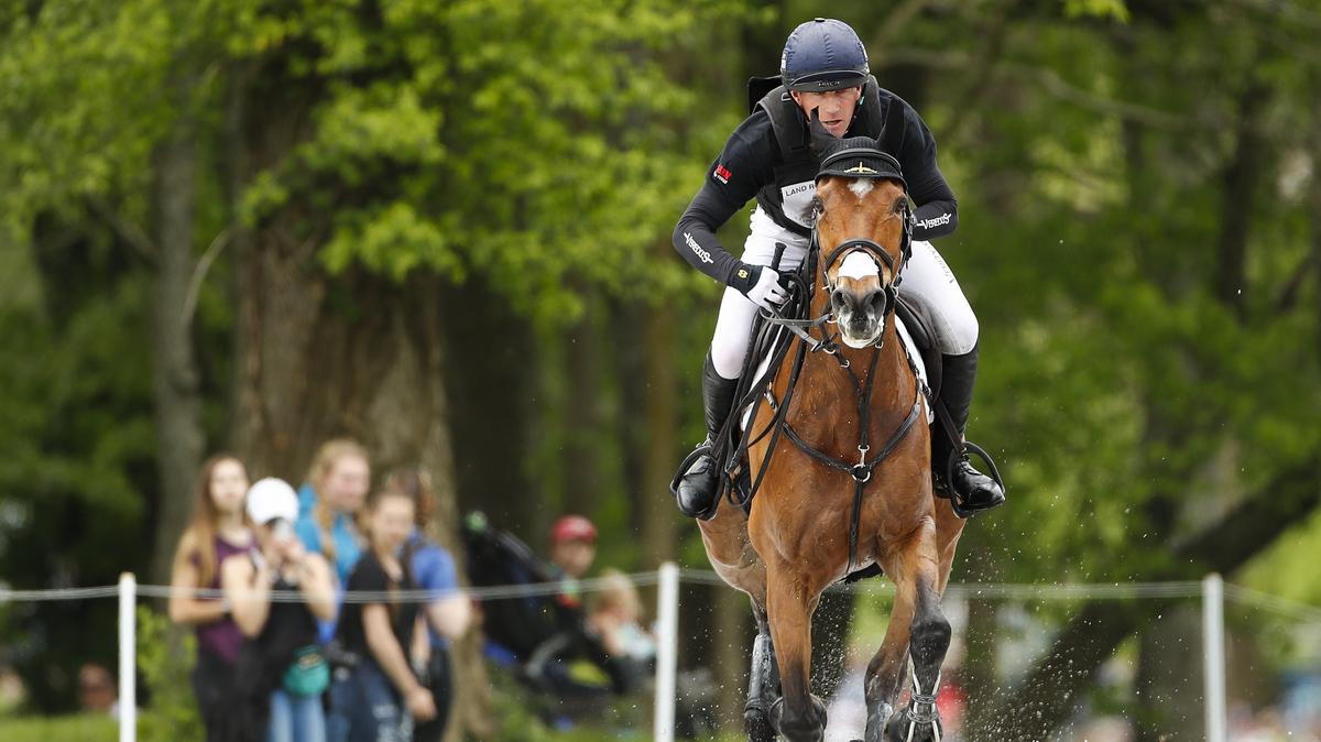 Oliver Townend aboard Cooley Master Class race toward the 19th jump during The Land Rover Kentucky Three-Day Event at the Kentucky Horse Park in Lexington, Ky., Saturday, April 27, 2019. Townend leads after two days.