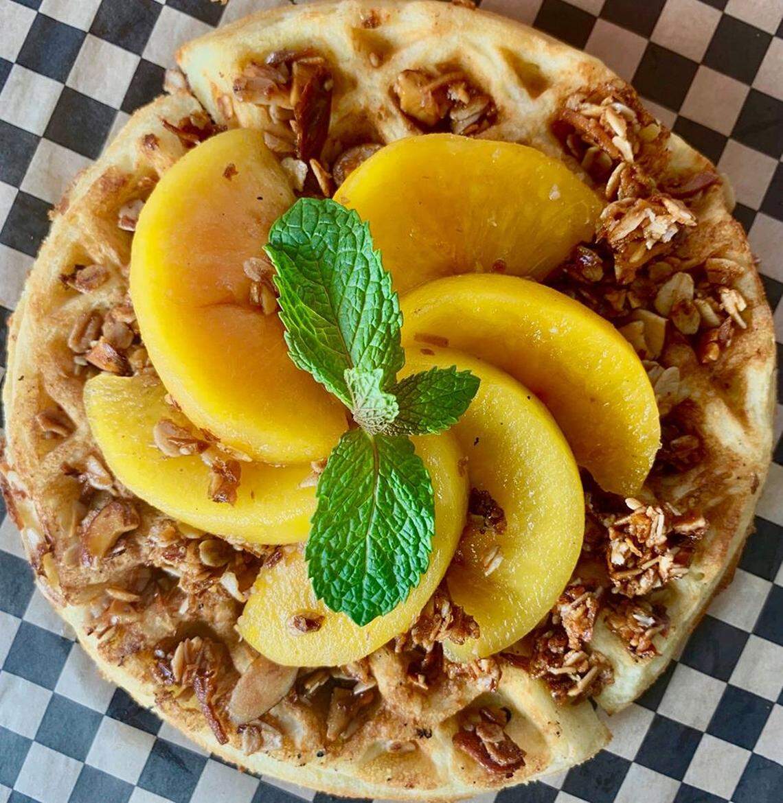 Martine’s Pastries weekend brunch features waffle specials including this peaches and cream waffle.