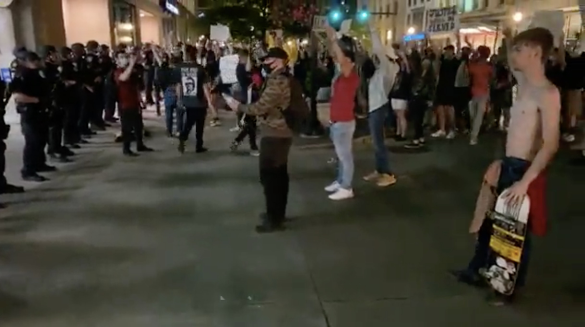 Lexington police are looking for an assault suspect (right) who was involved in Monday night’s protest downtown.