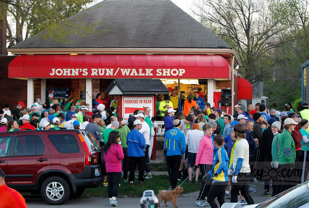 Runners gathered before a run at John’s Run and Walk Shop in 2013. Kick off the new year with a run or walk on Friday.