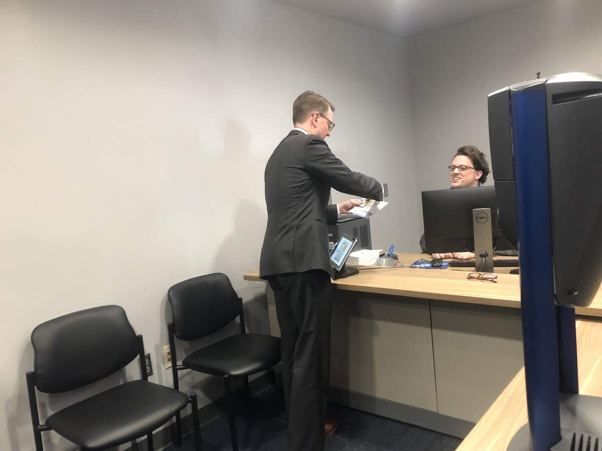 Kentucky Transportation Cabinet Secretary Jim Gray applies to get his Real ID-compliant license at Mero Street in Frankfort. The deadline for people to get Real ID-compliant licenses is October 1.
