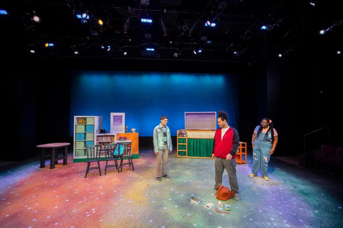Rusty Allen, from left, Zachary Myers, and Erica Dilworth, rehearse for “Shoyu Tell” which has its world premiere this weekend at the Lexington Children’s Theatre. The story is about a Japanese-American student whose lunchbox contents makes him the target of the school bully.