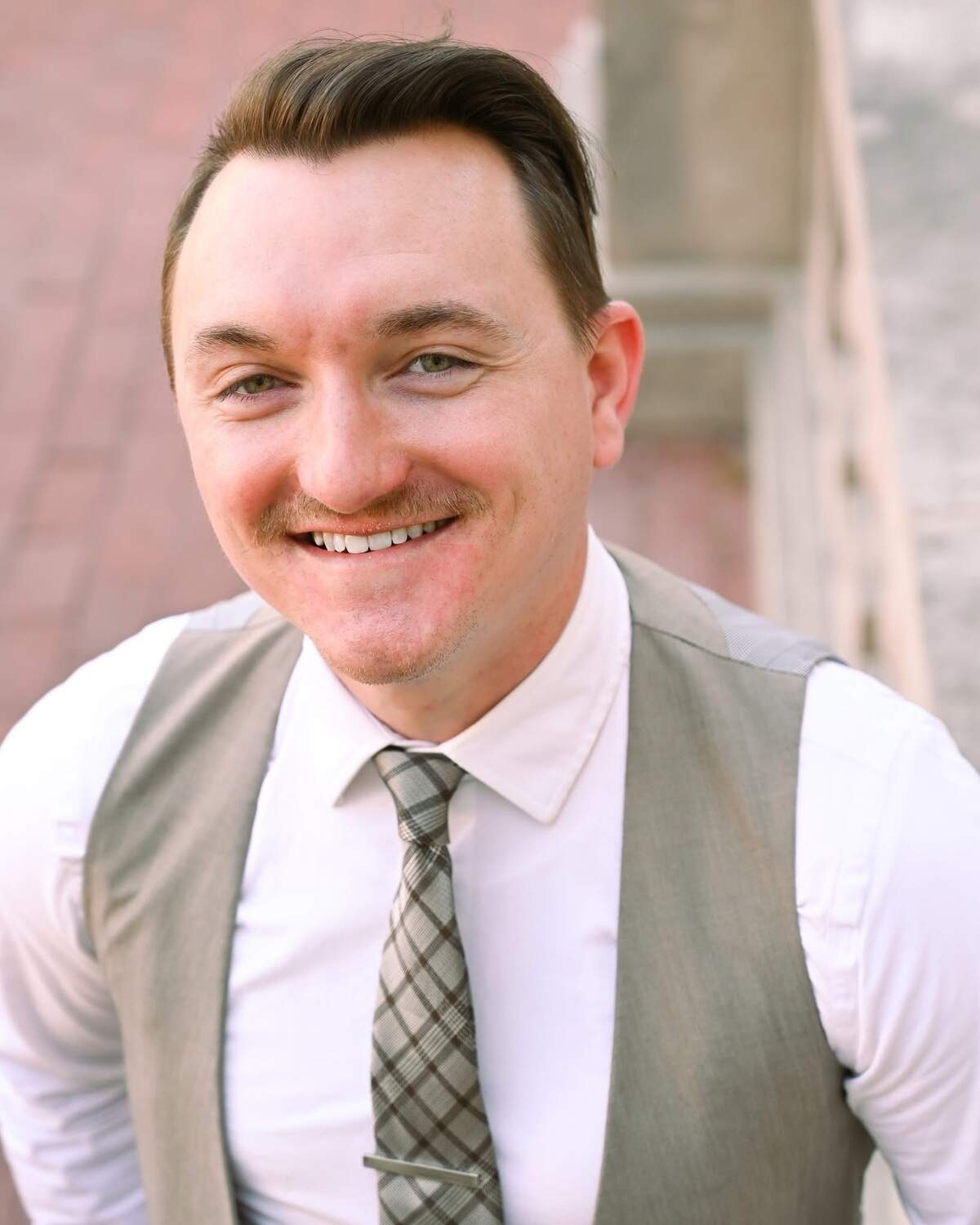 Dustin R. Isaacs is a communications professional and founder and president of Atlas & Ink Communications. He is the deputy communications director for the Kentucky Senate Majority Caucus.