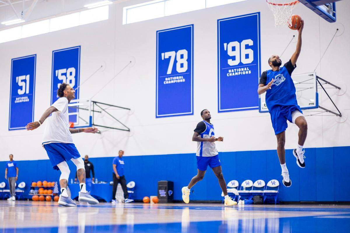 Andrew Harrison glides to the hoop during La Familia’s media day practice at the Joe Craft Center on Monday. La Familia advanced to the semifinals of the TBT last year and is back for another run at this year’s $1 million prize.
