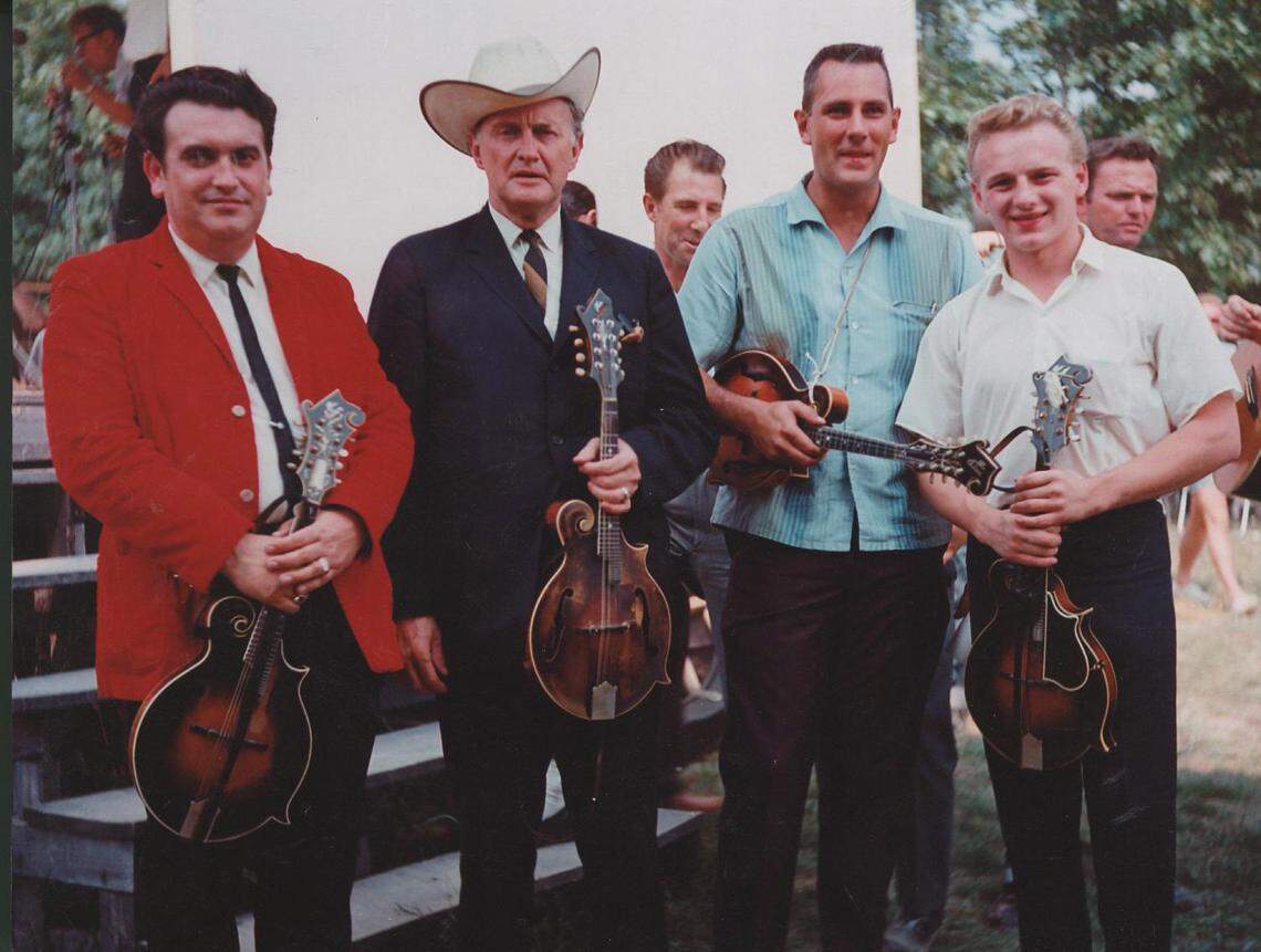 Bluegrass music forefather Bill Monroe, second from left, played the first multi-day bluegrass festival in history in 1965 on a horse farm in Fincastle, Va.