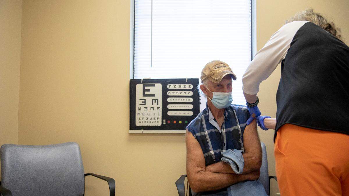 A patient in Lewis County receives his second dose of COVID-19 vaccine from the health department.