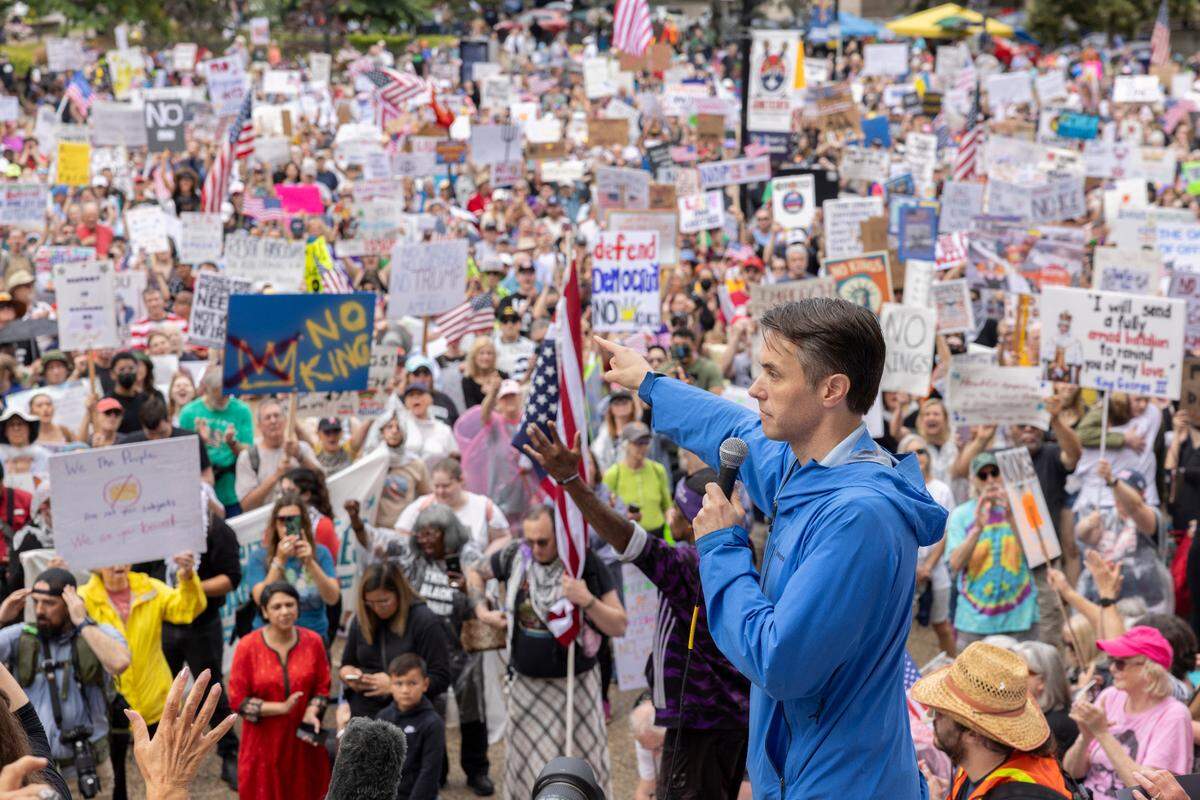 Congressman Morgan McGarvey speaks to the thousands of demonstrators gathered during the ‘No Kings’ march and protest at Metro Hall in downtown Louisville, Kentucky, Saturday, June 14, 2025. ‘No Kings’ rallies organized across the United States in direct response to President Donald Trump’s military parade in Washington D.C.