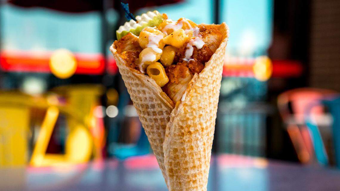 Spicy chicken in a savory waffle cone? Yes, please. Especially with mac and cheese and a pickle on top. The Cluck Cone will be on the menu of Joella’s Hot Chicken’s new food truck and for the next six weeks on the menu at all restaurant locations, too.