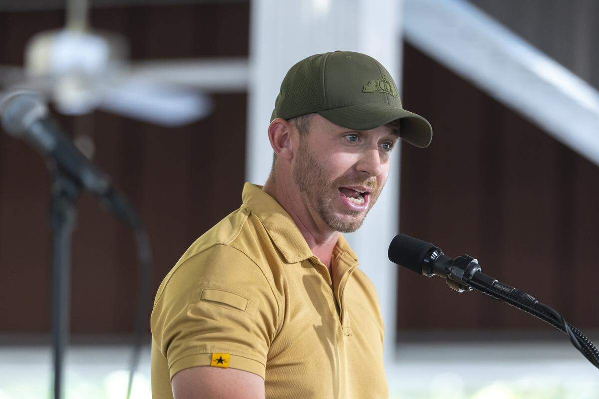 Kentucky Agriculture Commissioner Jonathan Shell delivers a speech at the 145th annual St. Jerome Fancy Farm Picnic in Fancy Farm, Ky., on Saturday, Aug. 2, 2025.