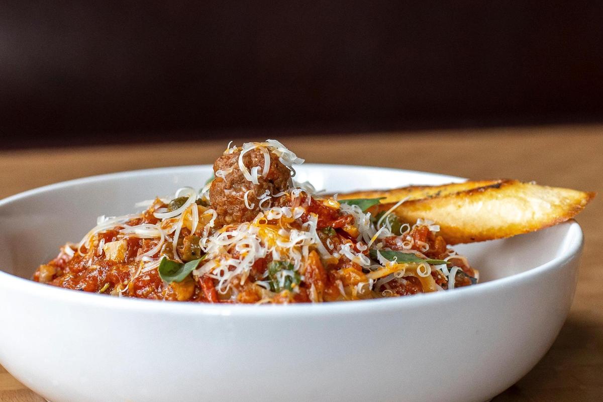 The Arrabbiata at Romero’s is served over fresh Cavatappi noodles with imported organic San Marzano tomatoes, garlic, capers and your choice of protein.