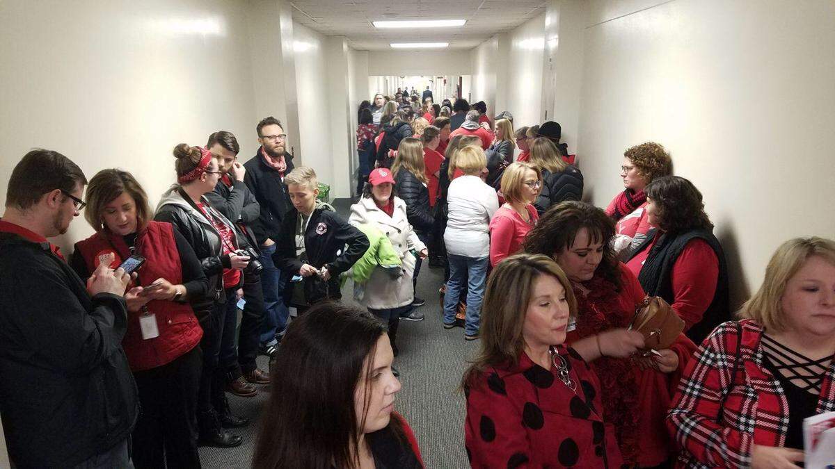 The hallways inside the Capitol Annex were packed Thursday with people protesting a bill that would restructure the board of the Teachers Retirement System, reducing educator control over investments.