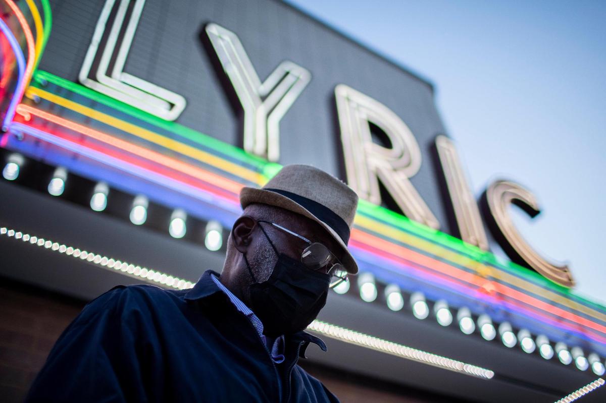 Charles Fields checks his phone outside the after a forum for mayoral and county attorney candidates at the Lyric Theatre in Lexington, Ky., Tuesday, April 26, 2022. “I think it’s going to be a lot closer than they think it is,” Fields said.