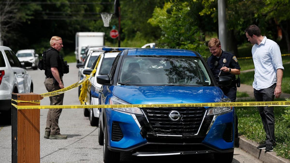 Lexington police examine a vehicle on Gatehouse Place, where Antonio “Tony” Cotton was last seen. FBI agents were trying to serve a warrant on Cotton when shots were fired between Cotton and law enforcement, according to the FBI.