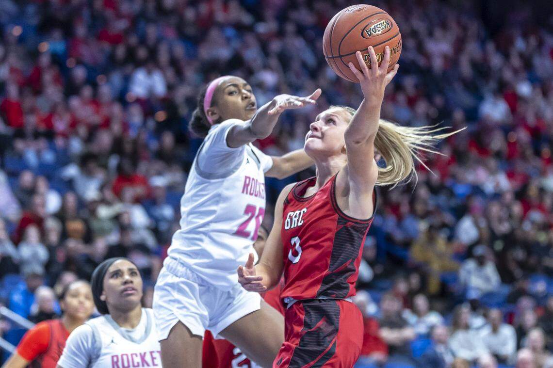 George Roger Clark's Kennedy Stamper (0) shoots the ball as Assumption's Kylie Moore (20) defends during the KHSAA girls' basketball championship at Rupp Arena in Lexington, Ky., on Saturday, March 14, 2026.